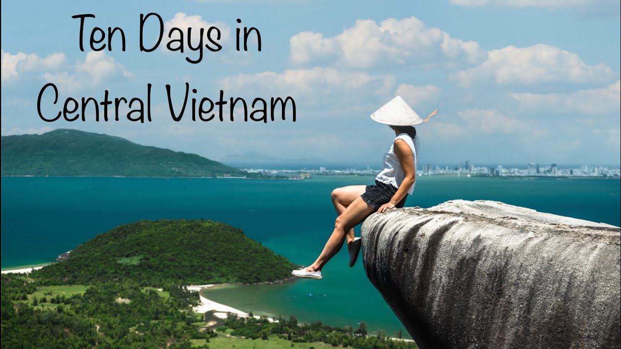 Traveller in a conical hat overlooking the coast of Central Vietnam