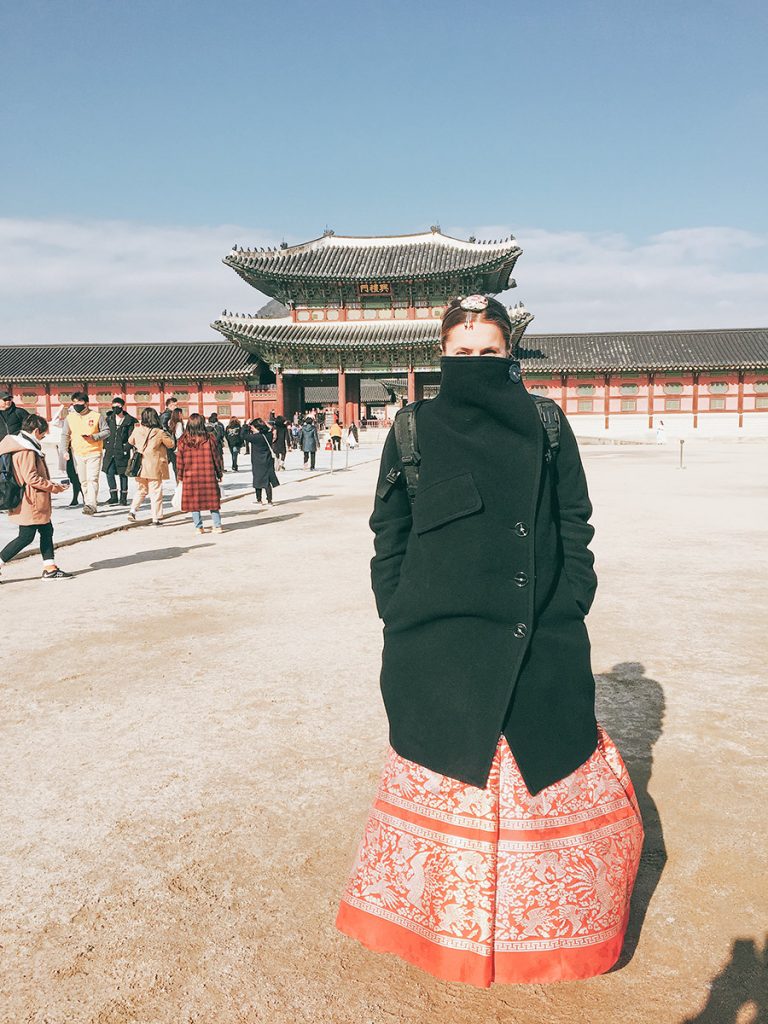 Traveler in traditional dress at Gyeongbokgung Palace