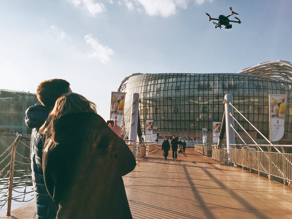 Drone filming over a modern plaza in Seoul