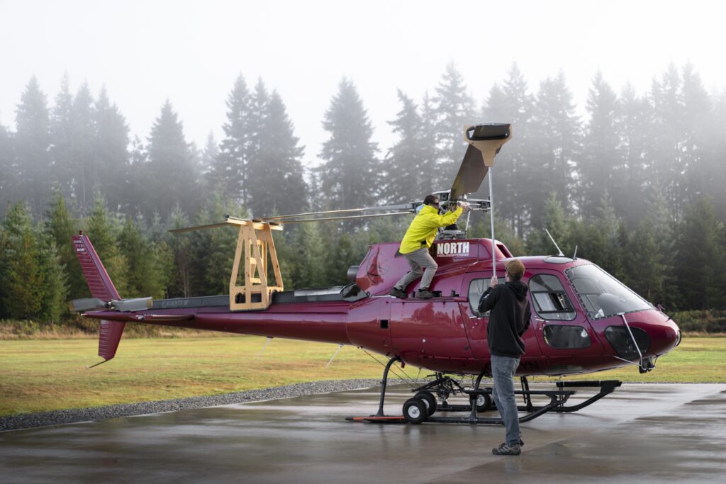 49 North helicopter and crew preparing for departure