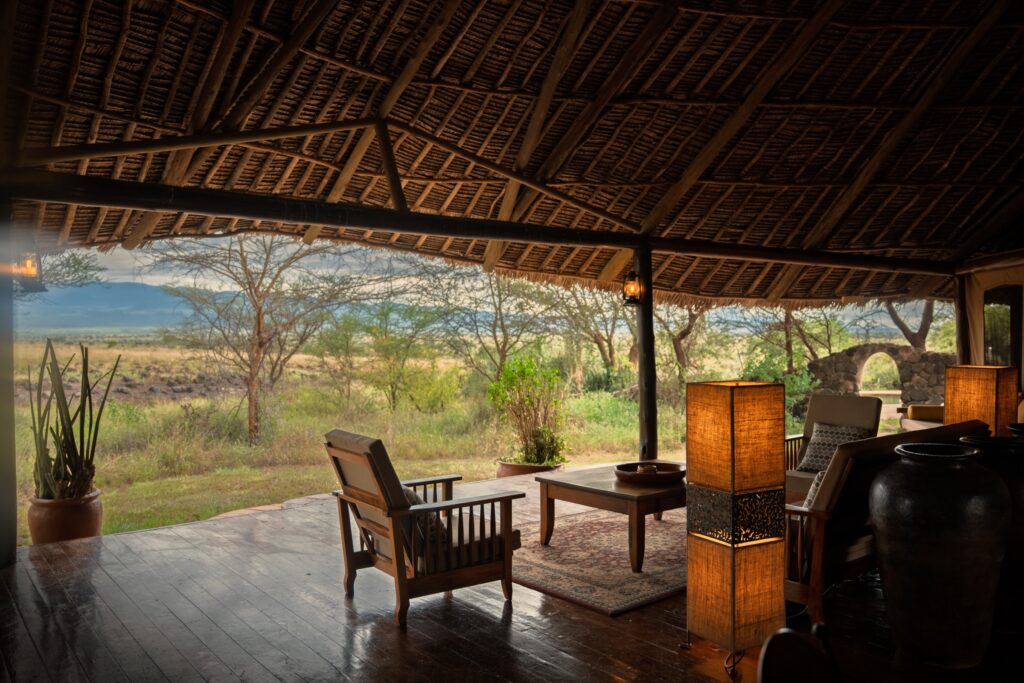 Open safari camp lounge overlooking the Kenyan landscape