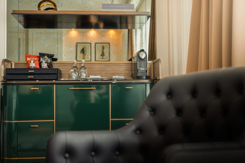 Green lacquered minibar cabinet inside a Breidenbacher Hof suite