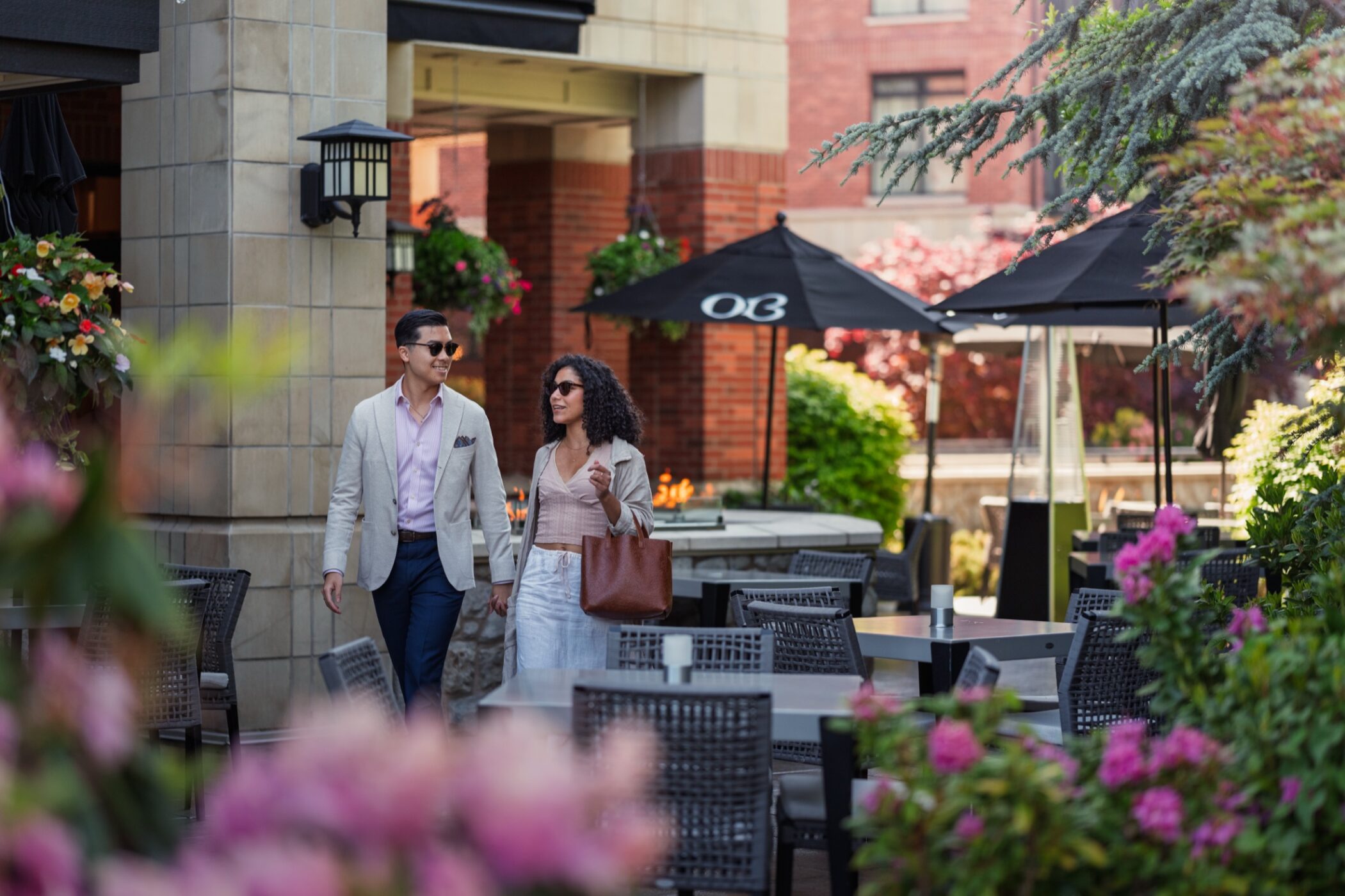 Guests arriving at Oak Bay Beach Hotel in Victoria