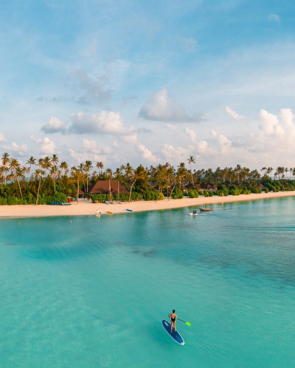 Aerial view of Olhuveli island and turquoise water in the Maldives