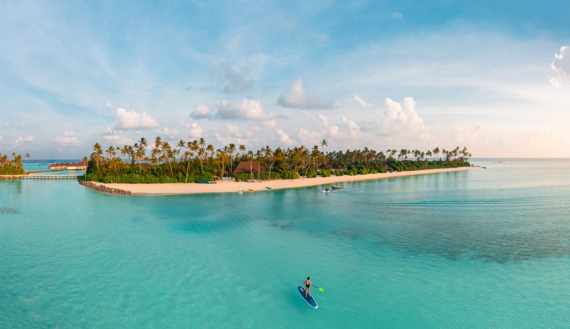 Aerial view of Olhuveli island and turquoise water in the Maldives