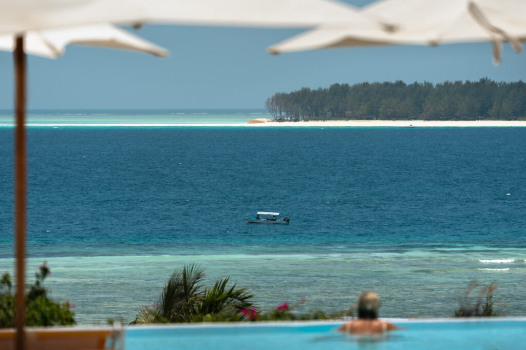 Infinity pool overlooking the Indian Ocean and Mnemba Island at The Mora Zanzibar