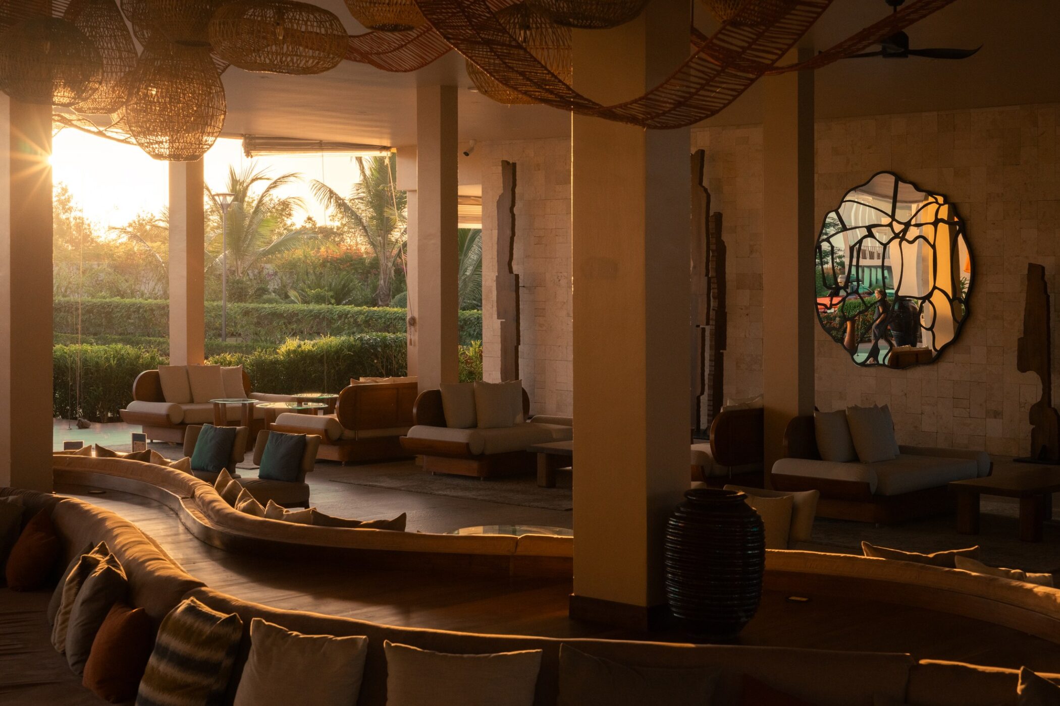 Open-air lobby at The Mora Zanzibar in warm evening light