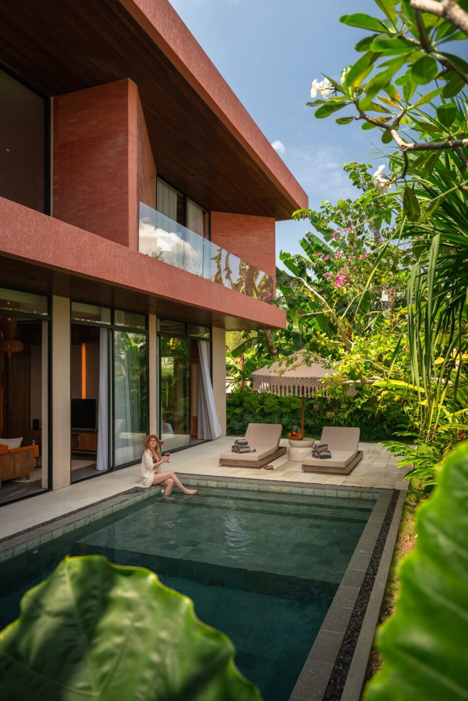 Private hotel villa opening onto a pool in Bali