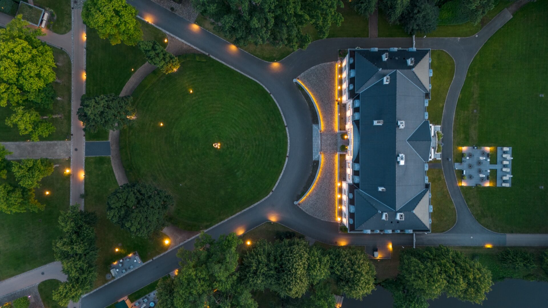 WEISSENHAUS resort illuminated beside the Baltic Sea at night