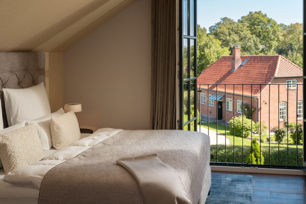 Luxury hotel bedroom at WEISSENHAUS in northern Germany