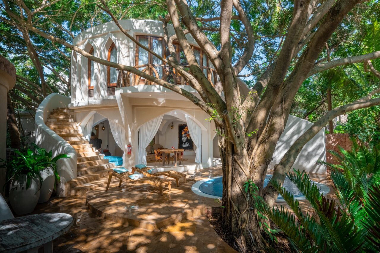 Multi-level Villa Alfajiri beneath mature tropical trees at Xanadu Villas Zanzibar