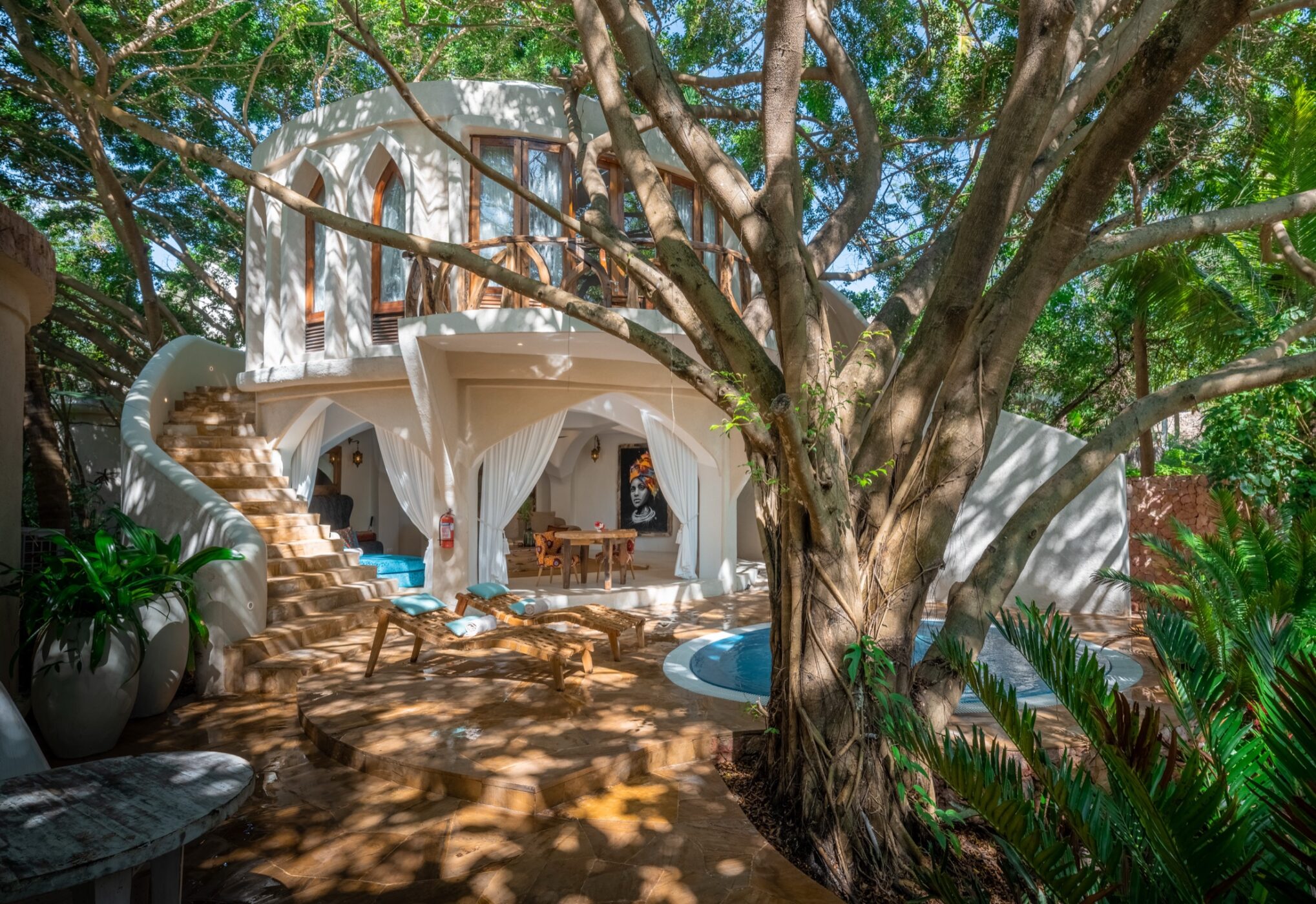Multi-level Villa Alfajiri beneath mature tropical trees at Xanadu Villas Zanzibar