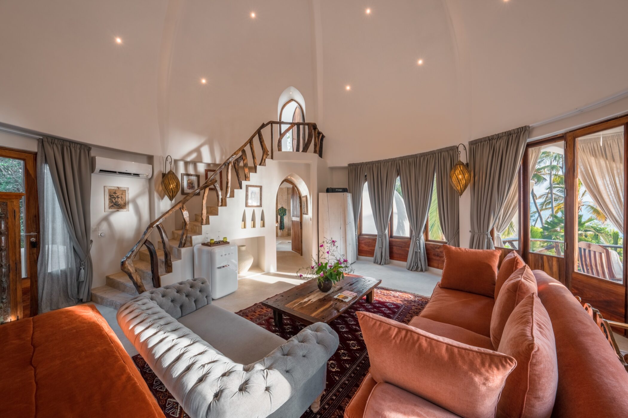 Upstairs bedroom with handcrafted details at Villa Nyota